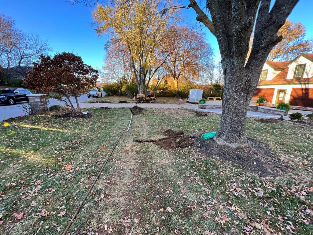 Installing an in ground irrigation system.