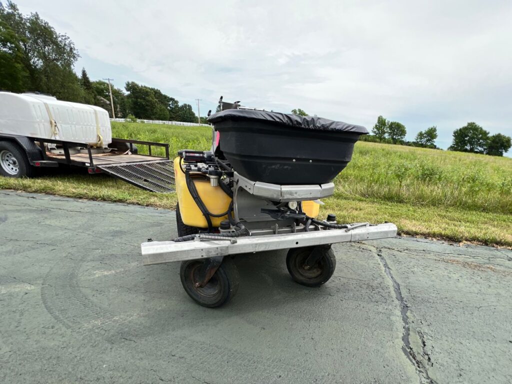 A machine filled with lawn chemical spray.